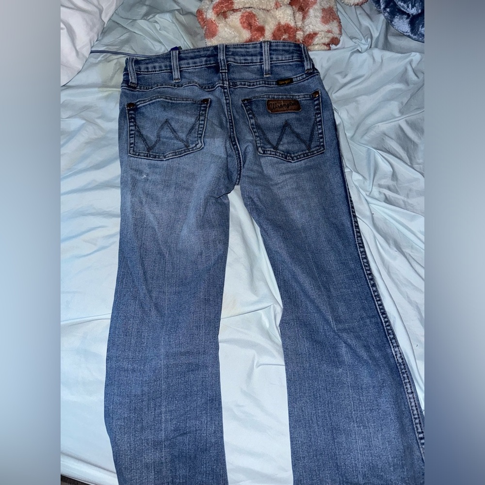 wrangler jeans size 26 super flared at bottom perfect for boots or cuffing